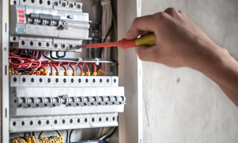 electrician fixing circuit board